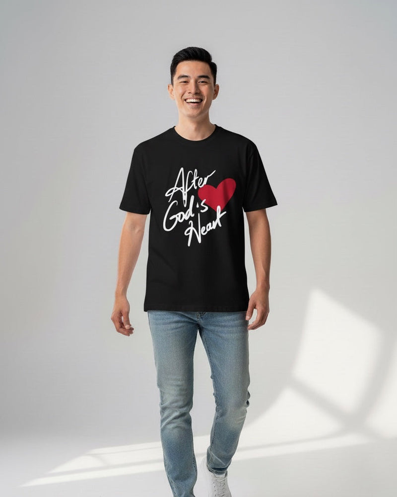 Man wearing a black t-shirt with a graphic design on a white background