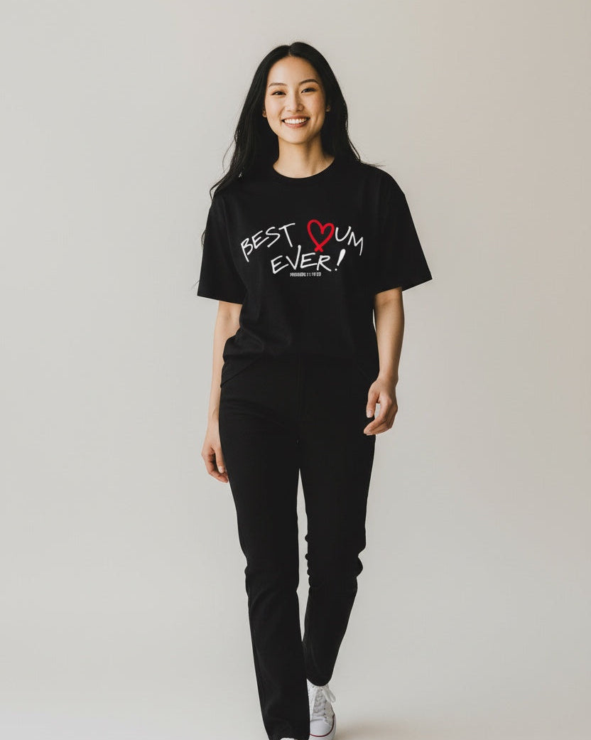 Person wearing a black t-shirt with 'Best Mum Ever' text on a plain background