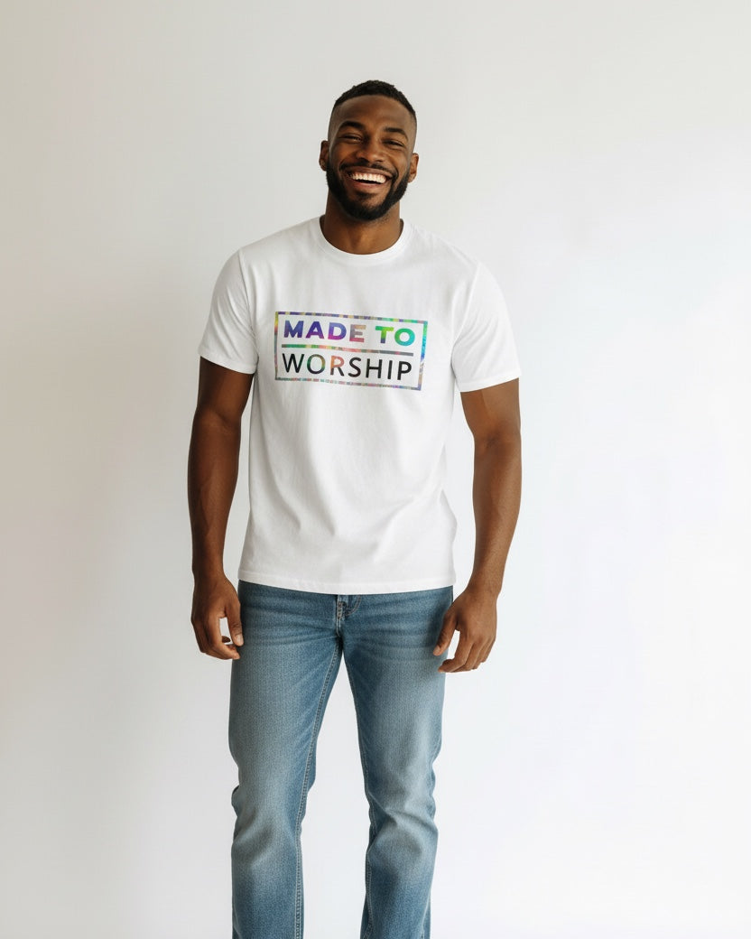 Man wearing a white t-shirt with 'Made to Worship' text on a plain background